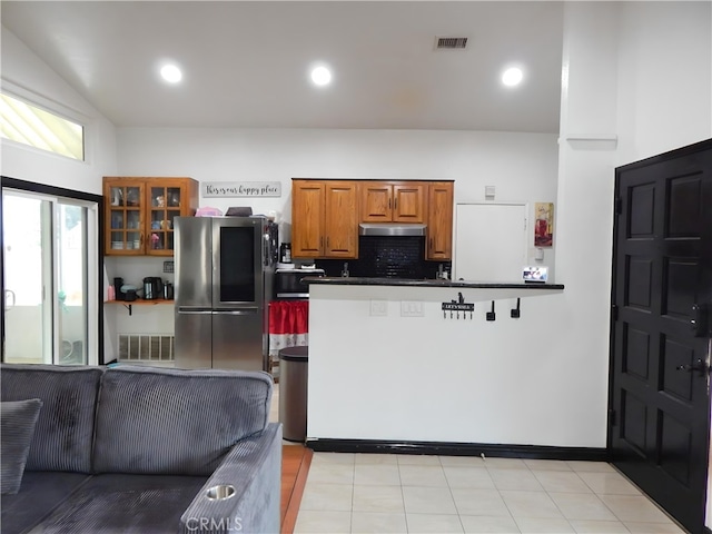 11622 Remington St, Sylmar, CA 91342 - kitchen with smart refrigerator, brown cabinets, glass insert cabinets, a peninsula, and under cabinet range hood
