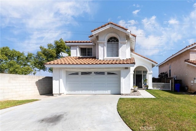 15910 Peach Tree Ln, Fontana, CA 92337 - mediterranean / spanish house with a tiled roof, stucco siding, and concrete driveway
