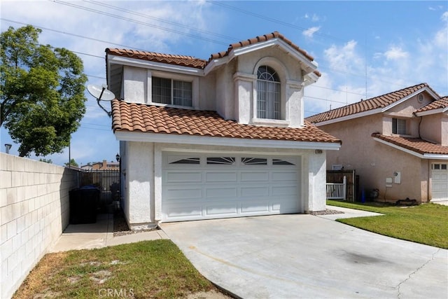15910 Peach Tree Ln, Fontana, CA 92337 - mediterranean / spanish house featuring concrete driveway, stucco siding, a garage, and a tiled roof