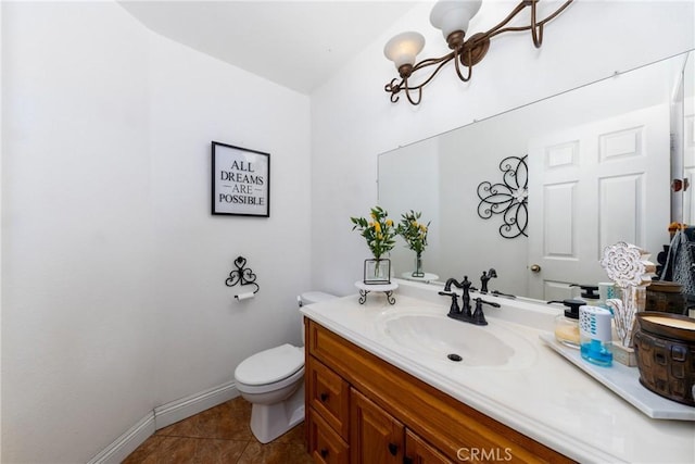 15910 Peach Tree Ln, Fontana, CA 92337 - bathroom with vanity, baseboards, toilet, and tile patterned floors