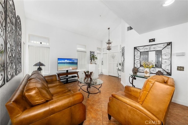 15910 Peach Tree Ln, Fontana, CA 92337 - living area featuring high vaulted ceiling, tile patterned floors, and baseboards
