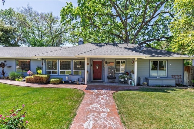 5540 Capistrano Ave, Atascadero, CA 93422 - ranch-style home with a front lawn, a shingled roof, covered porch, and fence