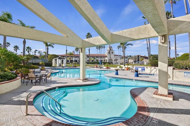 pool with a patio area