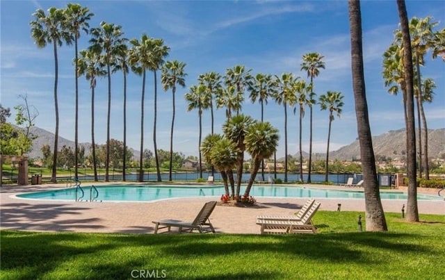 10075 Desert Mallow, Moreno Valley, CA 92557 - community pool with a mountain view and a yard