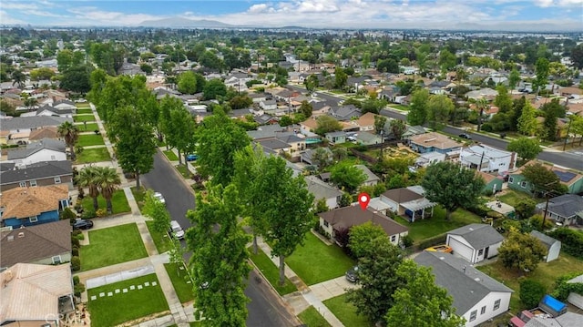 birds eye view of property with a residential view