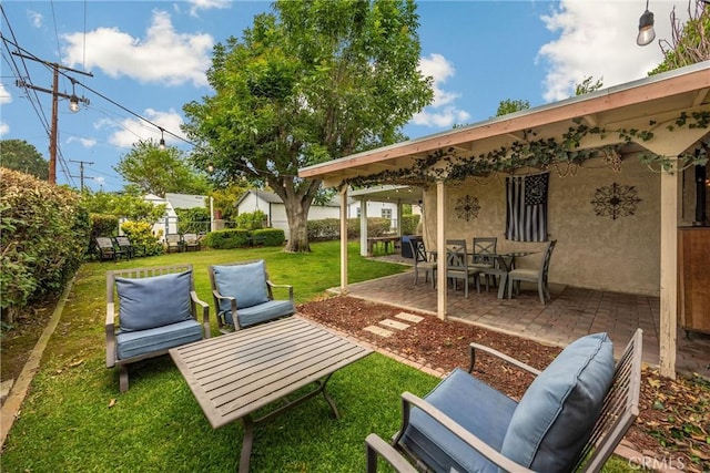 view of yard with a patio, outdoor lounge area, and a fenced backyard
