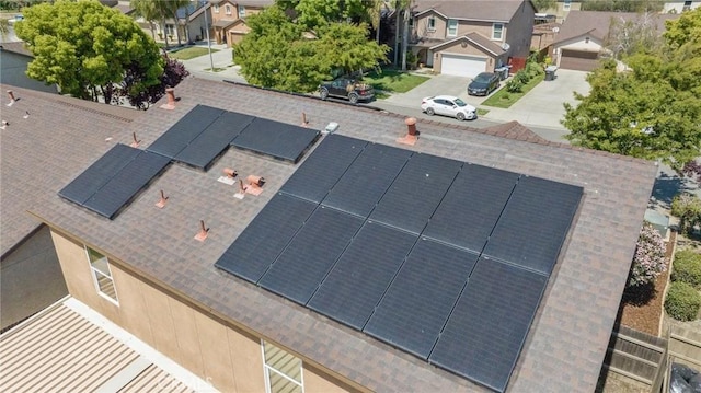 drone / aerial view with a residential view