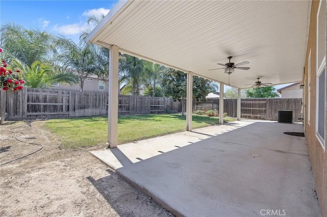 view of patio with a ceiling fan, central air condition unit, and a fenced backyard