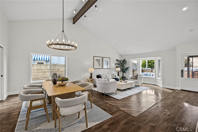 dining area featuring beam ceiling, a chandelier, high vaulted ceiling, baseboards, and wood finished floors