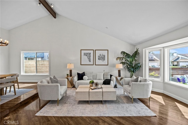 living room with beamed ceiling, a notable chandelier, baseboards, wood finished floors, and high vaulted ceiling