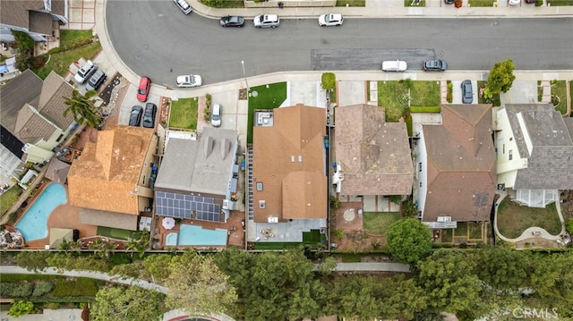 birds eye view of property with a residential view