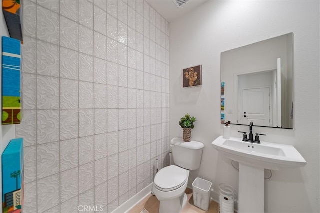 bathroom featuring toilet