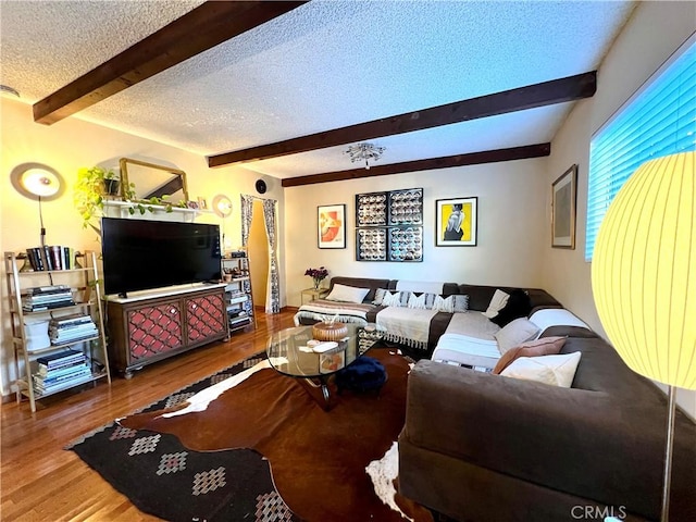 3704 Hellman Ave, Los Angeles, CA 90032 - living room with a textured ceiling, beam ceiling, and wood finished floors