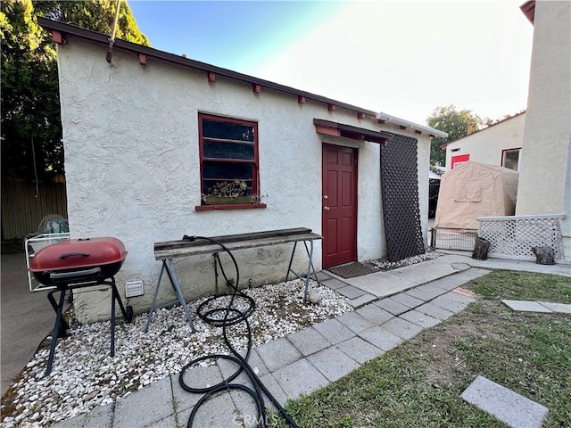 3704 Hellman Ave, Los Angeles, CA 90032 - rear view of property featuring stucco siding
