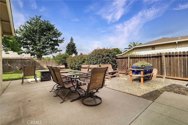 view of patio / terrace with outdoor dining area and a fenced backyard