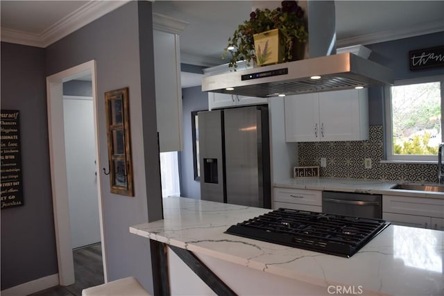 kitchen featuring a sink, black gas stovetop, ventilation hood, ornamental molding, and stainless steel fridge with ice dispenser