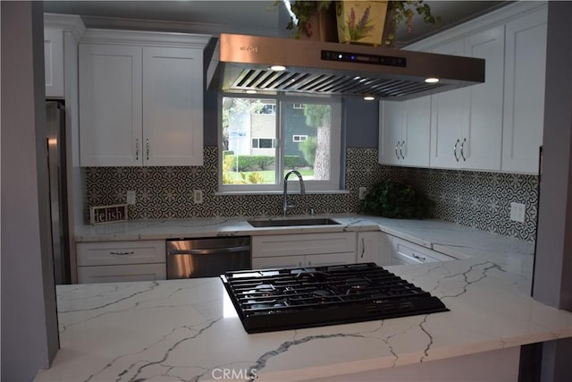 kitchen with decorative backsplash, stainless steel dishwasher, a sink, black gas stovetop, and range hood