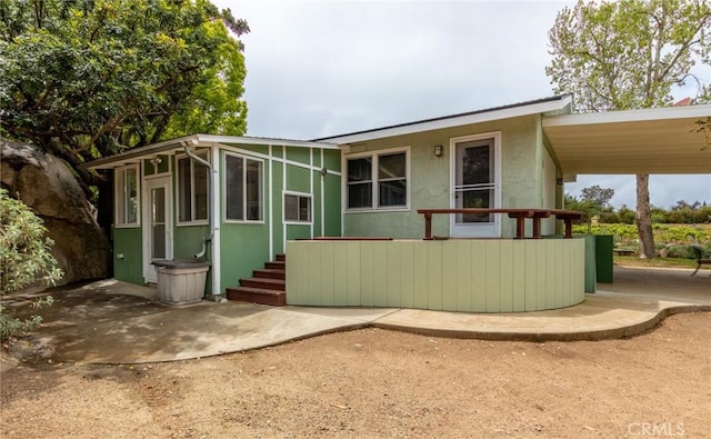 20095 Gustin Rd, Perris, CA 92570 - back of house with a sunroom and stucco siding