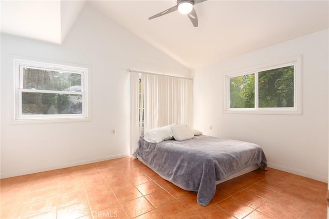 20095 Gustin Rd, Perris, CA 92570 - bedroom with a ceiling fan, baseboards, vaulted ceiling, and light tile patterned floors