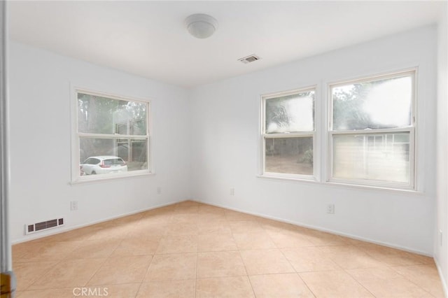 20095 Gustin Rd, Perris, CA 92570 - unfurnished room with light tile patterned flooring, baseboards, and visible vents