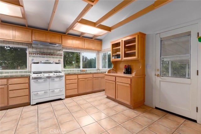 20095 Gustin Rd, Perris, CA 92570 - kitchen with decorative backsplash, tile countertops, range with two ovens, lofted ceiling with beams, and under cabinet range hood