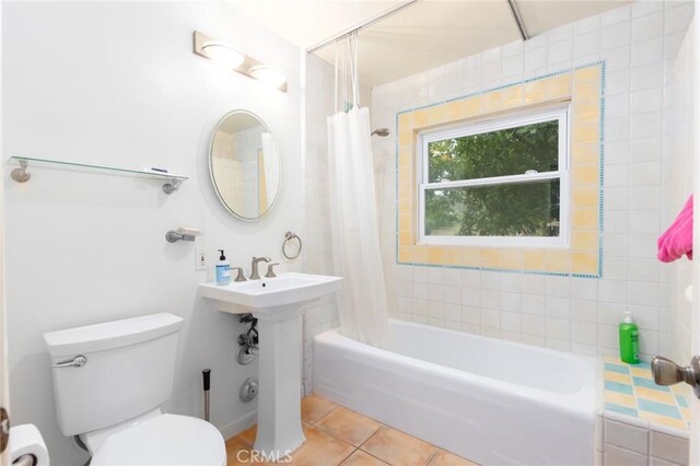 20095 Gustin Rd, Perris, CA 92570 - bathroom with toilet, tile patterned floors, and shower / bath combination with curtain
