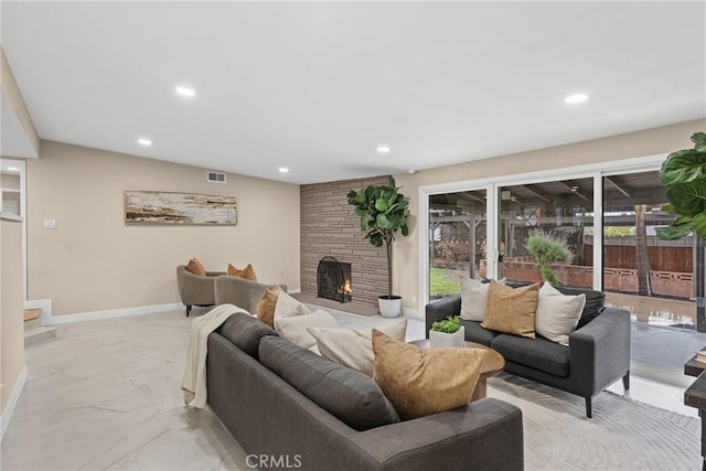 living room with a large fireplace, visible vents, baseboards, recessed lighting, and marble finish floor