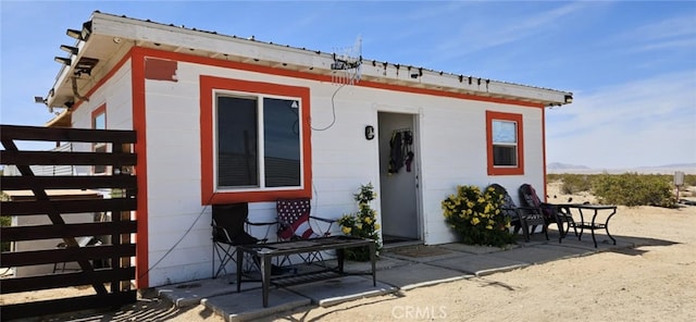 back of property with a patio area