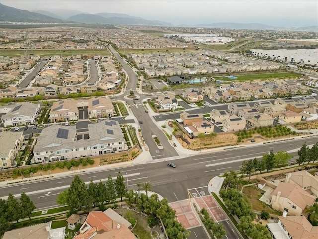 drone / aerial view with a residential view and a mountain view
