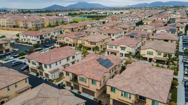 aerial view featuring a residential view and a mountain view