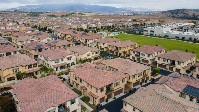 aerial view with a mountain view and a residential view