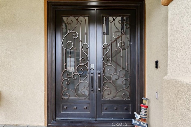 35183 Flamingo Way, Winchester, CA 92596 - entrance to property featuring french doors and stucco siding