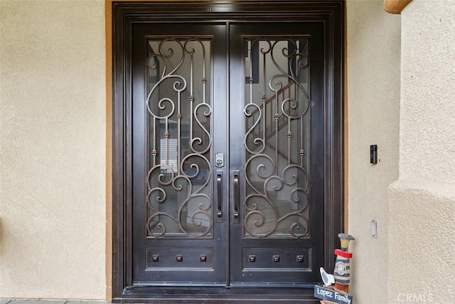 35183 Flamingo Way, Winchester, CA 92596 - doorway to property with french doors and stucco siding