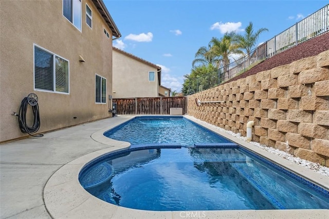 35183 Flamingo Way, Winchester, CA 92596 - view of swimming pool featuring a fenced backyard, a pool with connected hot tub, and a patio area