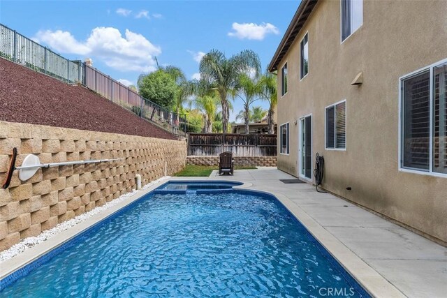 35183 Flamingo Way, Winchester, CA 92596 - view of pool featuring a fenced backyard, a patio area, and a pool with connected hot tub