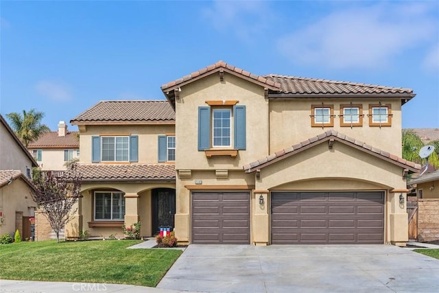 35183 Flamingo Way, Winchester, CA 92596 - mediterranean / spanish home with an attached garage, a tile roof, driveway, and stucco siding
