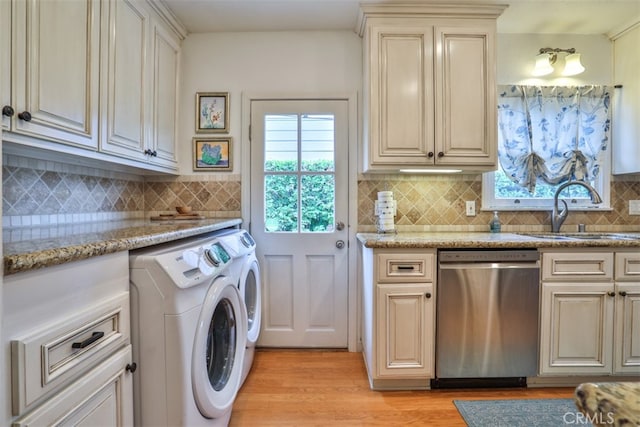 1956 E Woodlyn Rd, Pasadena, CA 91104 - clothes washing area featuring separate washer and dryer, laundry area, a sink, and light wood-style flooring