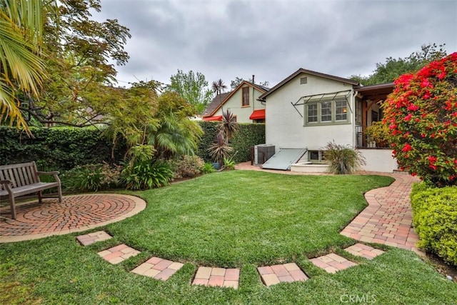 1956 E Woodlyn Rd, Pasadena, CA 91104 - view of yard featuring a patio area and central AC
