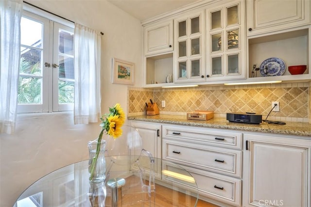 1956 E Woodlyn Rd, Pasadena, CA 91104 - bar with french doors and decorative backsplash