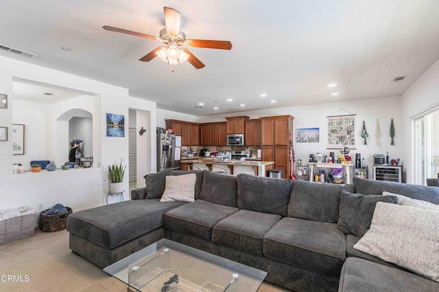 10909 Rainwater Ln, Bakersfield, CA 93306 - living room with recessed lighting, a ceiling fan, visible vents, and light carpet