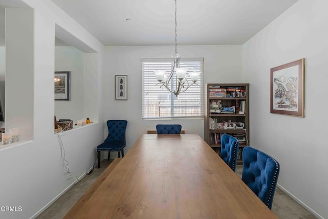 10909 Rainwater Ln, Bakersfield, CA 93306 - dining room with carpet, a notable chandelier, and baseboards