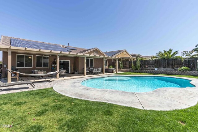 10909 Rainwater Ln, Bakersfield, CA 93306 - view of swimming pool with a fenced backyard and a patio