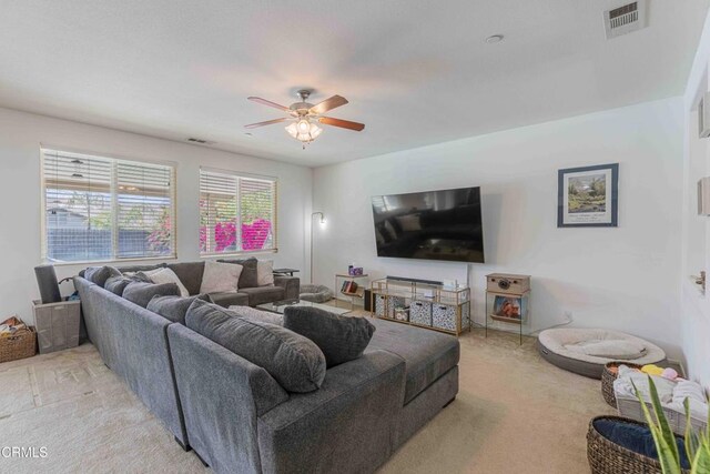 10909 Rainwater Ln, Bakersfield, CA 93306 - living area with light carpet and a ceiling fan