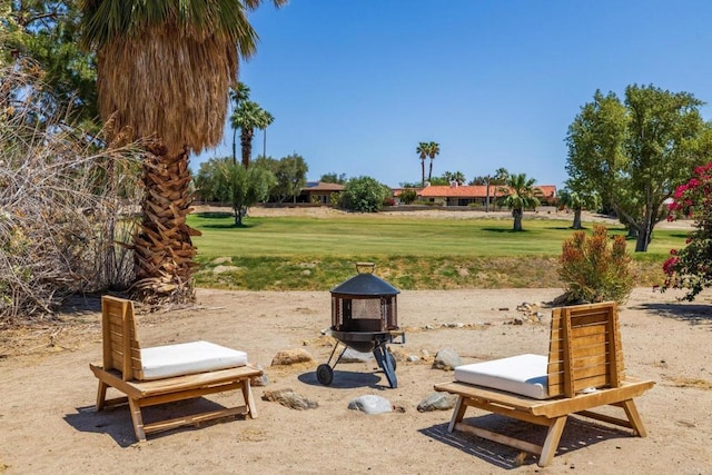 surrounding community with a lawn