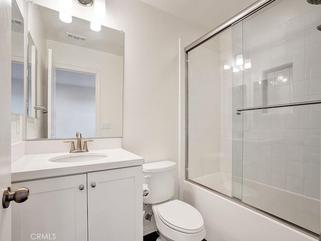 15331 Jasmine Ln Unit 105, Gardena, CA 90249 - bathroom with vanity, toilet, and combined bath / shower with glass door