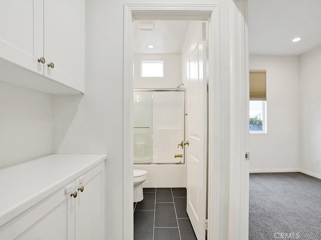 15331 Jasmine Ln Unit 105, Gardena, CA 90249 - full bath featuring healthy amount of natural light, toilet, enclosed tub / shower combo, tile patterned floors, and recessed lighting