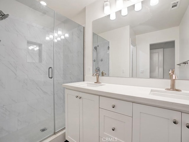 15331 Jasmine Ln Unit 105, Gardena, CA 90249 - bathroom featuring a marble finish shower and double vanity