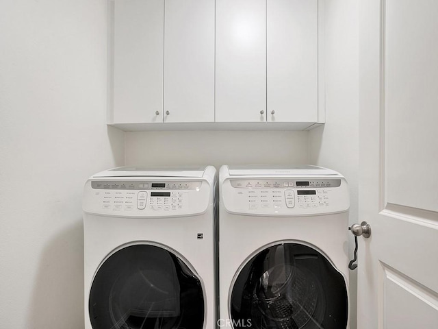 15331 Jasmine Ln Unit 105, Gardena, CA 90249 - clothes washing area featuring washer and dryer and cabinet space