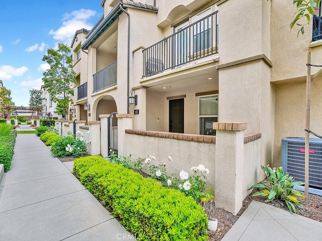 15331 Jasmine Ln Unit 105, Gardena, CA 90249 - view of building exterior with a fenced front yard and central air condition unit