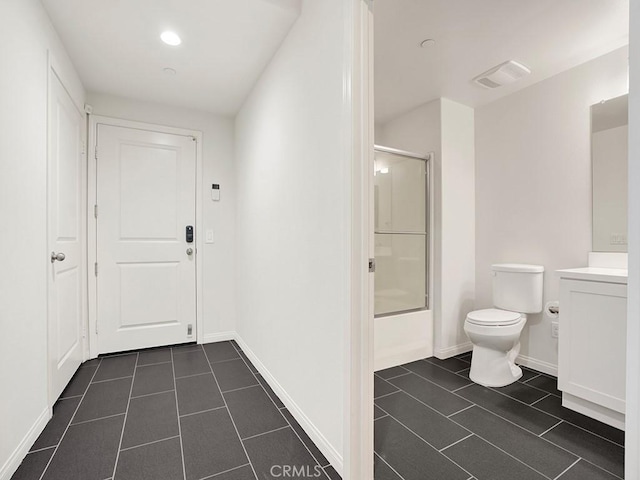 15331 Jasmine Ln Unit 105, Gardena, CA 90249 - bathroom featuring tile patterned floors, toilet, vanity, bath / shower combo with glass door, and baseboards